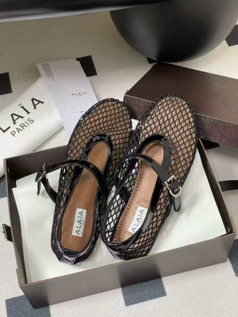 Alaia Black Fishnet Mary Jane Flats with Patent Strap